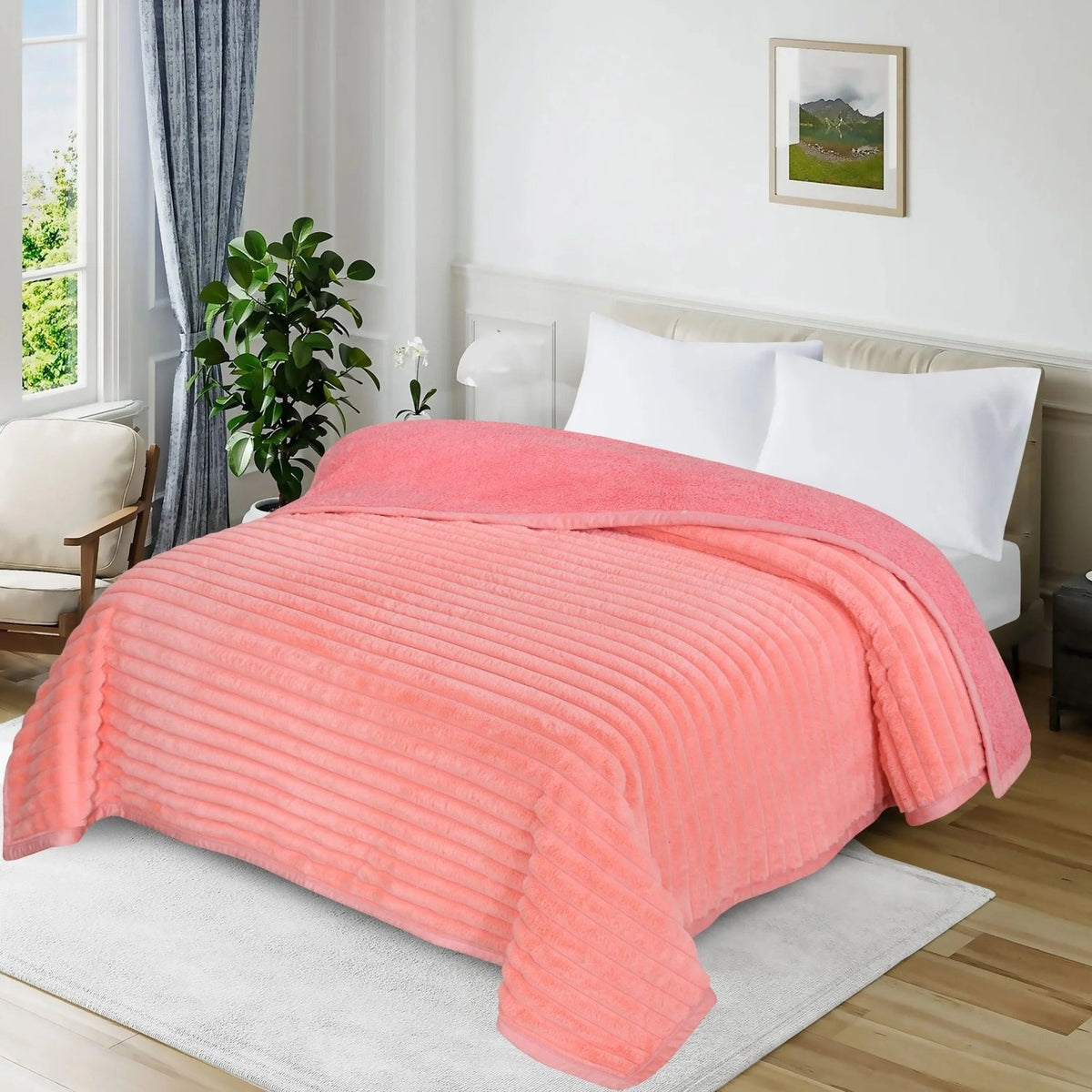 Soft pink ribbed plush blanket draped over a bed in a bright, modern bedroom.