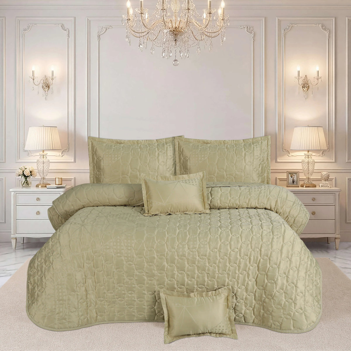 Elegant champagne gold quilted bedspread set with matching pillows in a luxury bedroom.