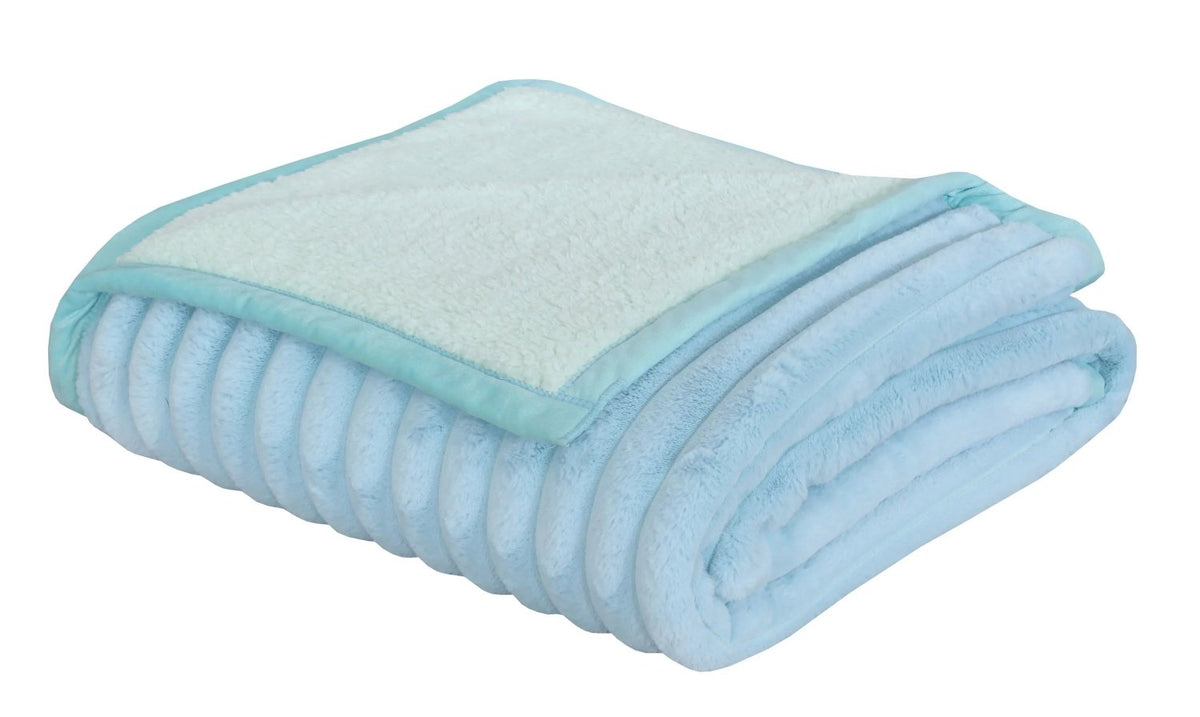 Folded light blue plush fleece blanket with a soft textured finish