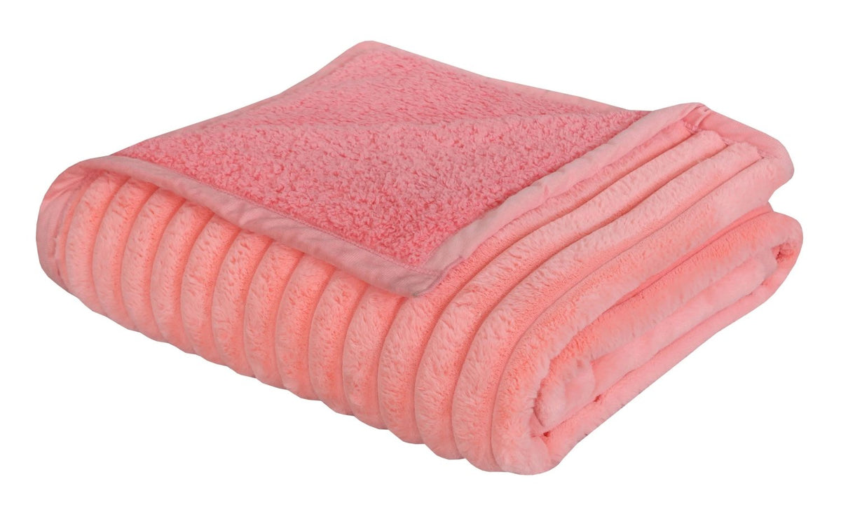 Folded plush pink fleece blanket with ribbed texture and soft fabric