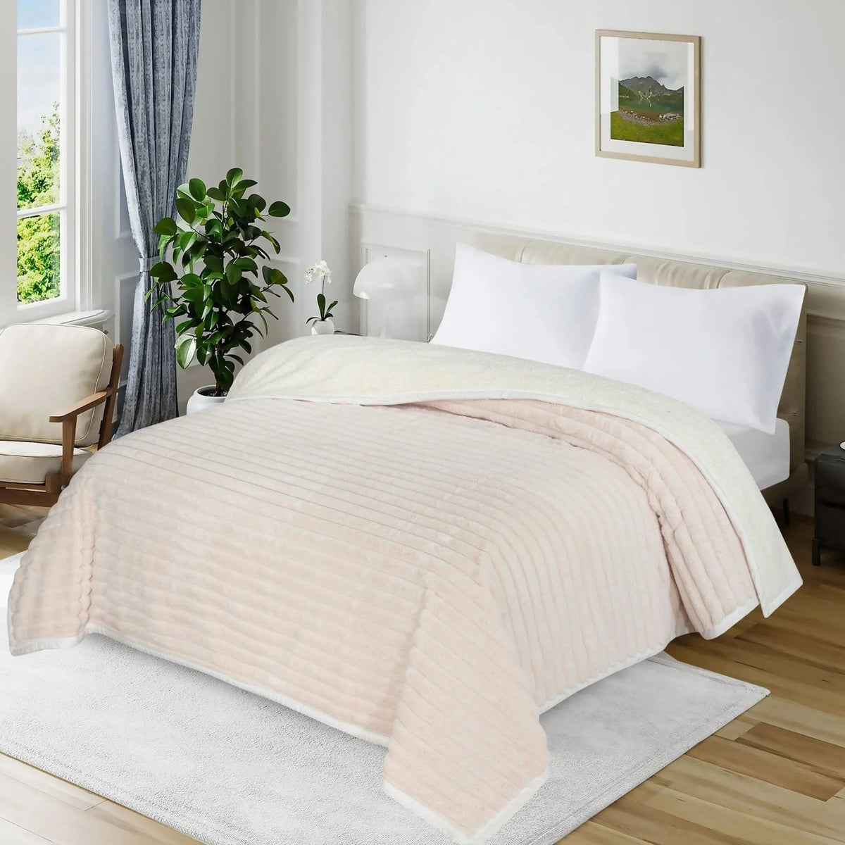 Soft blush pink ribbed textured blanket on a white bed in a bright modern bedroom